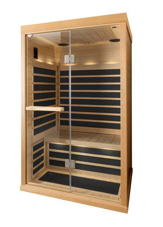 Tylö infraroodcabine in een wellnessruimte, gebruikt voor ontspanning en comfortabele infraroodwarmte.